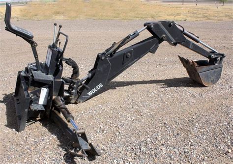 wood backhoe dual skid steer|skid steer backhoe attachment used.